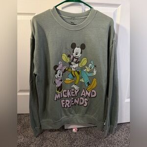 Disney sweater size S new it’s like color green